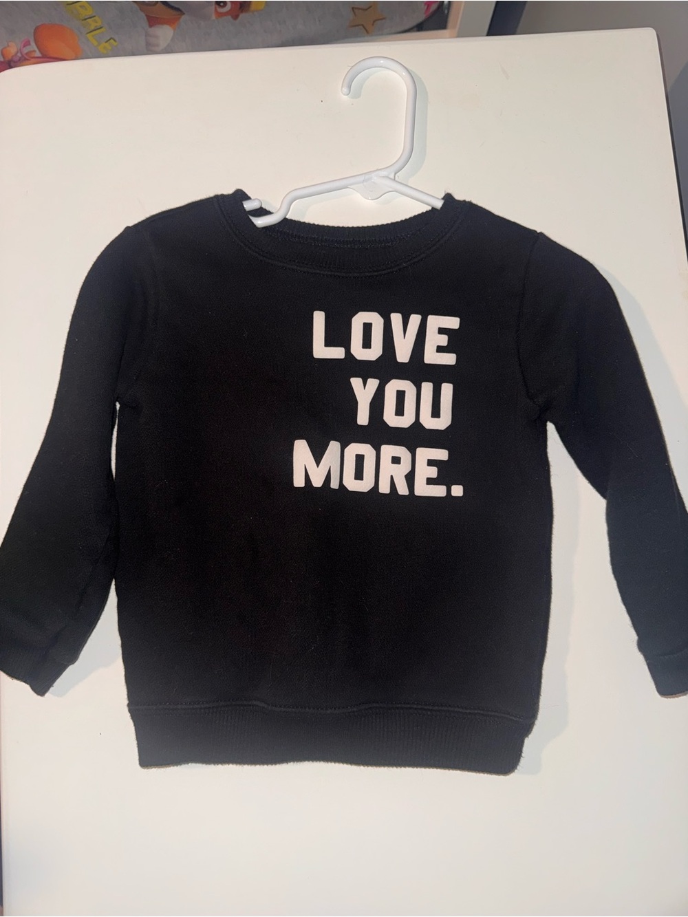 Black Sweatshirt with White "LOVE YOU MORE." Graphic